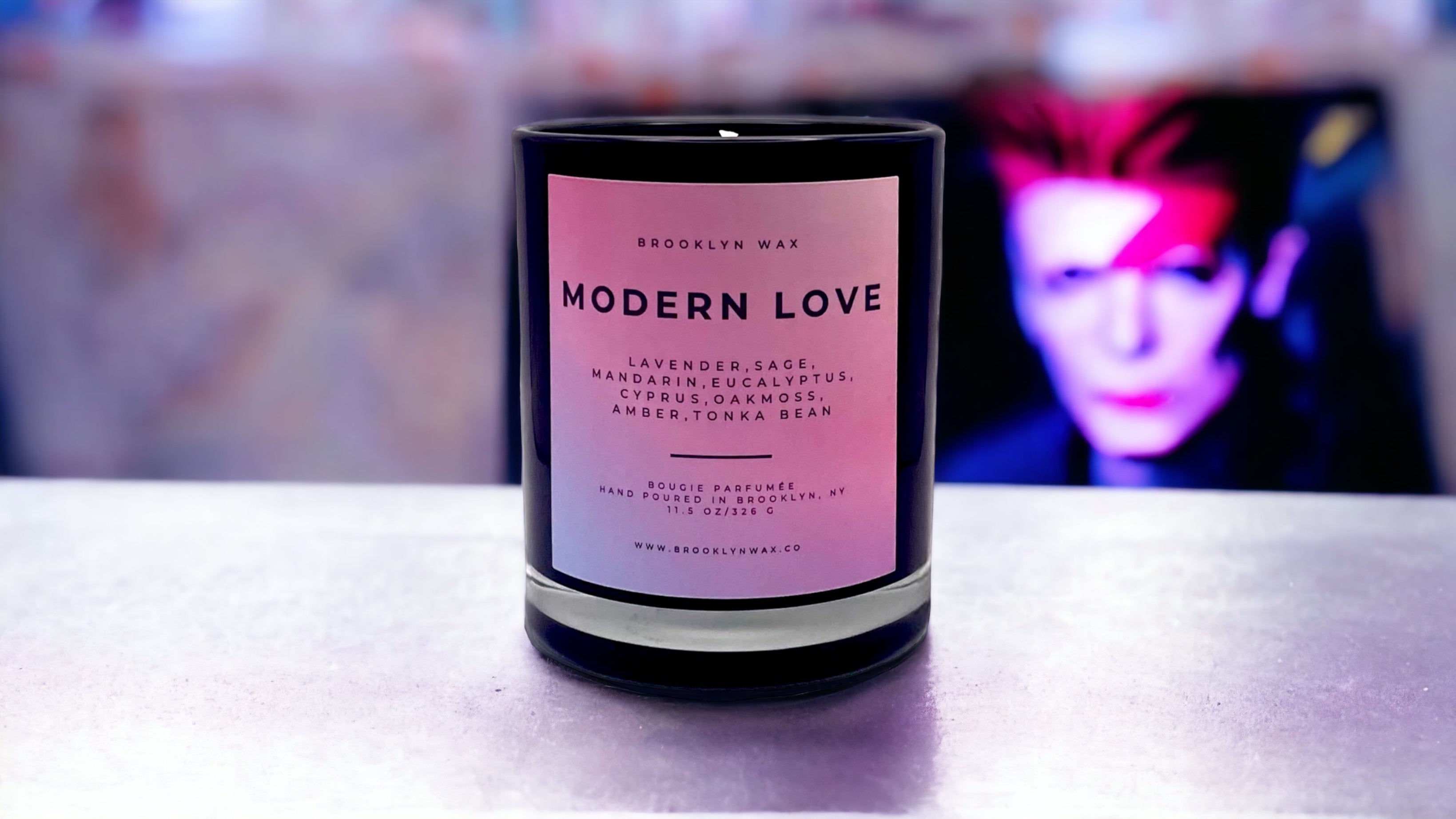 Modern Love Scented Candle in front of David Bowie